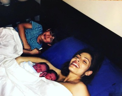 Sarah Shahi took a picture after giving birth to her twins, Violet Moon Howey and Knox Blue.